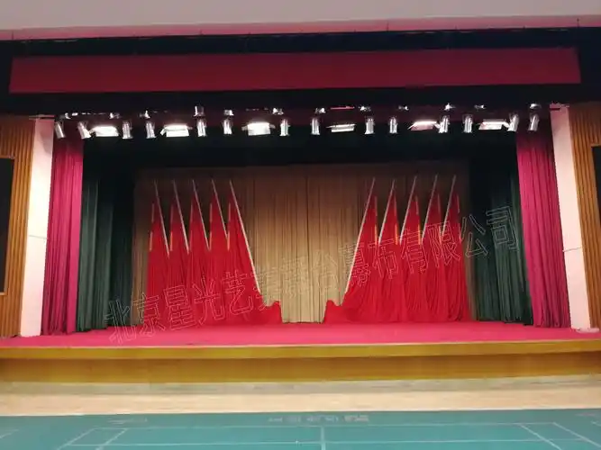 北京旧礼堂舞台幕布更换方案|阻燃防火幕布更换
